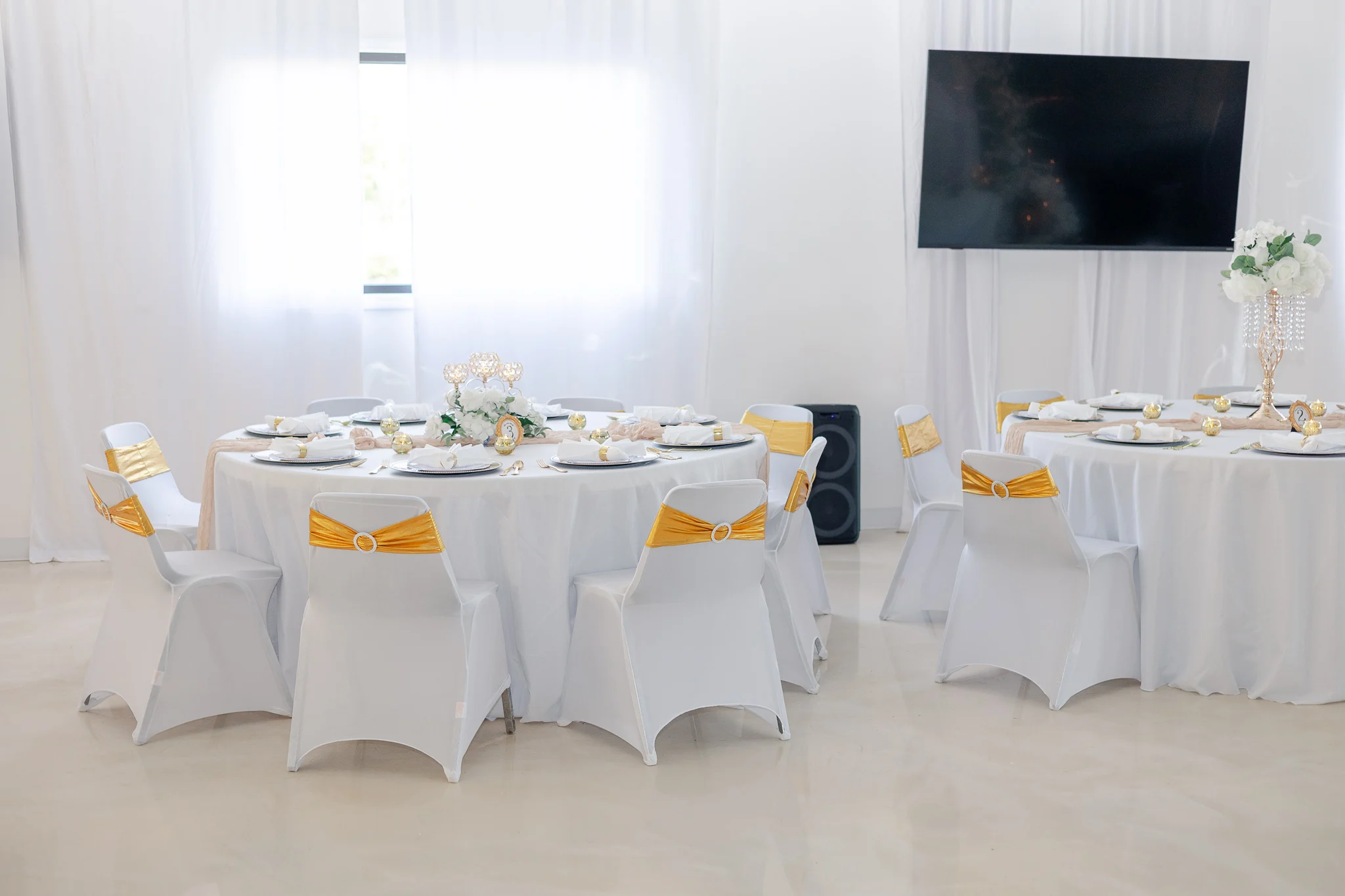 The full hall styled for an evening celebration